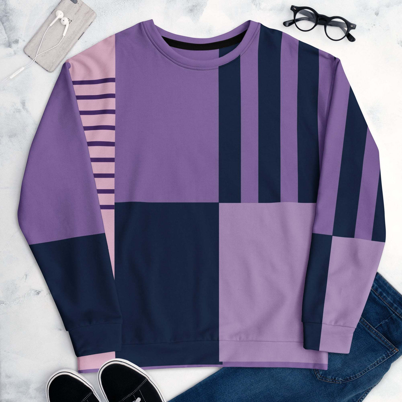 Unisex sweatshirt with purple and navy geometric patterns, made from soft brushed fleece fabric