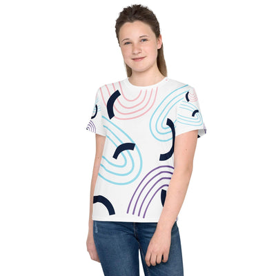 Youth crew neck t-shirt with colorful abstract design, soft stretch fabric, and regular fit modeled by a teen girl