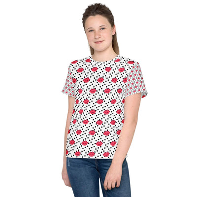 Teen wearing a colorful youth crew neck t-shirt with red lips and black polka dot design