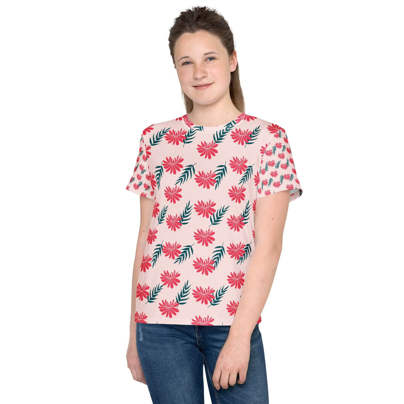 Youth crew neck t-shirt with pink floral and green leaf pattern worn by a teen girl