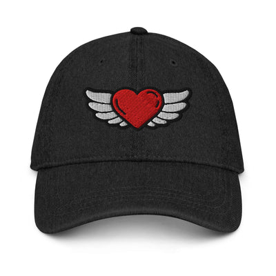 Black denim hat with red heart and white wings embroidered on the front, adjustable strap, and six-panel design