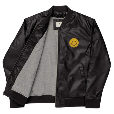 Black leather bomber jacket with smiley face patch and rib-knit collar, cuffs, and hem, featuring side pockets and inside lining.