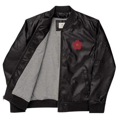 Black leather bomber jacket with rib-knit collar, cuffs, and hem, featuring side and sleeve utility pockets and a red flower embroidery on the chest