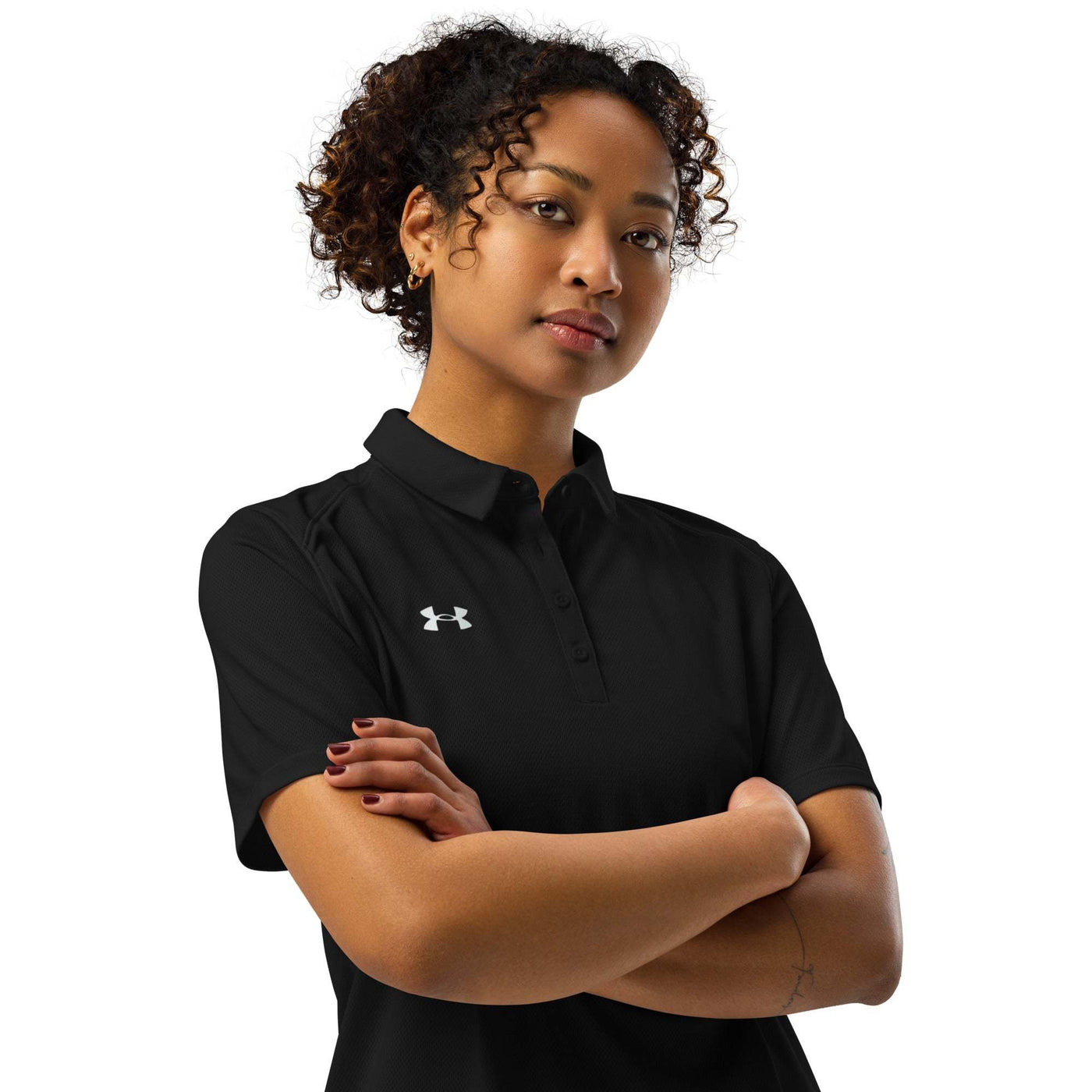 Under Armour women’s black polo shirt with anti-odor, breathable fabric and logo on chest