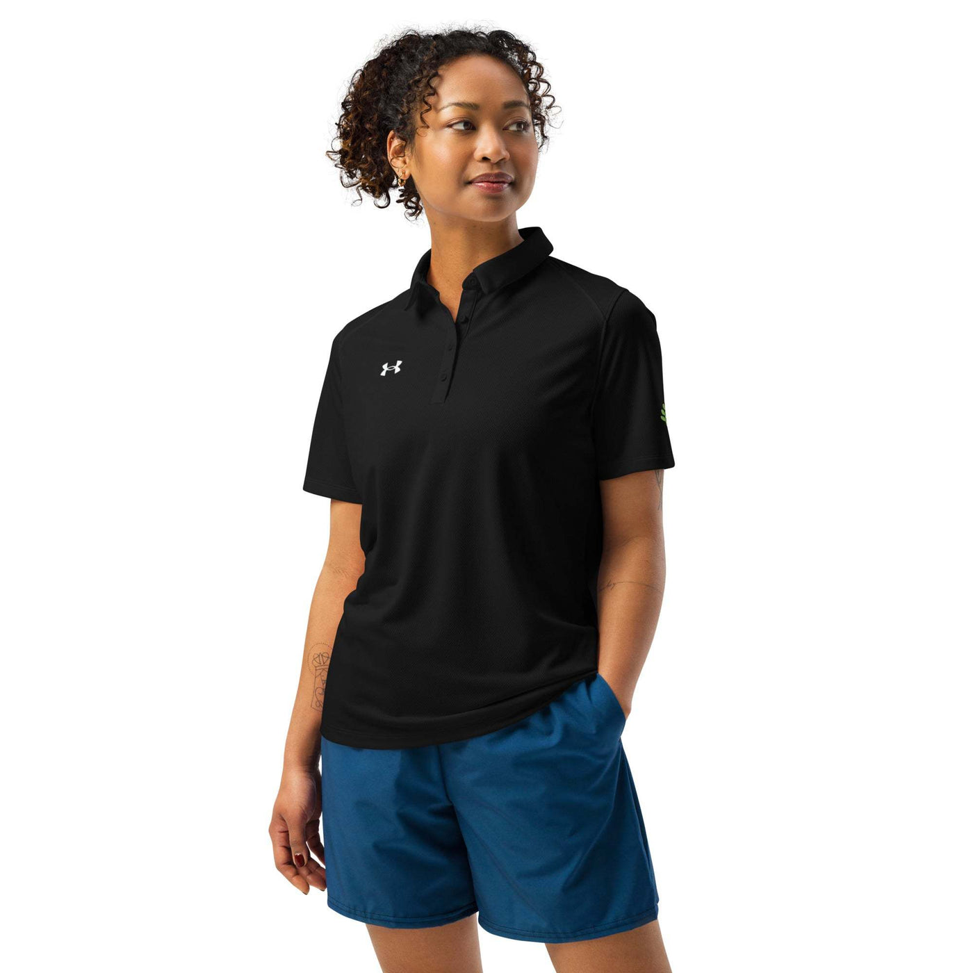 Under Armour® women’s black polo shirt with breathable, anti-odor fabric and relaxed fit