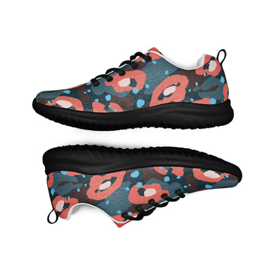 Women’s athletic shoes with vibrant abstract pattern, lightweight flyknit upper, black rubber outsole, and padded collar for comfort.