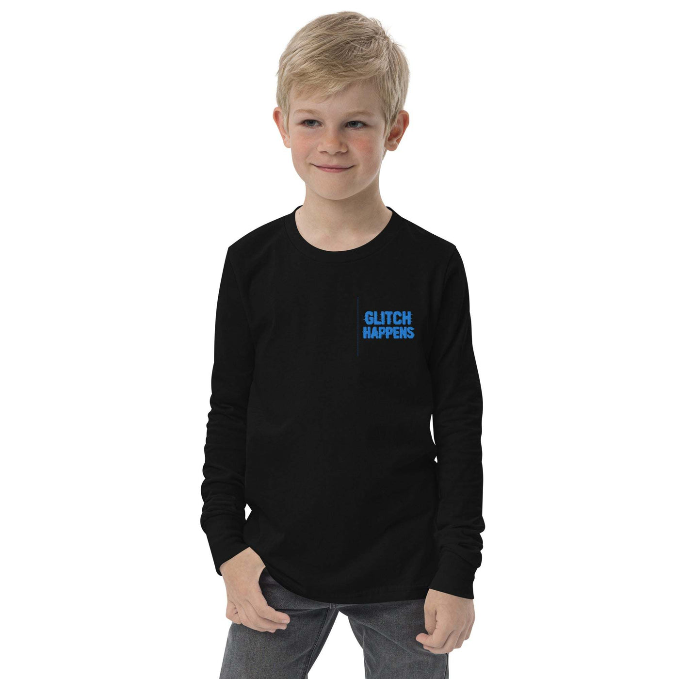 Youth long sleeve tee in black with "Glitch Happens" text, worn by boy with classic crew neck and ribbed cuffs